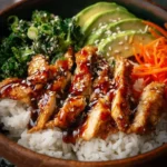 30-Minute Teriyaki Chicken Bowl garnished with vegetables and sauce.
