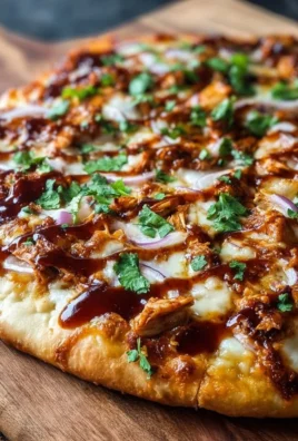 Delicious BBQ Chicken Pizza with smoky barbecue sauce and toppings.