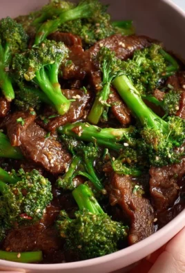 Delicious Beef and Broccoli stir-fry served on a plate with vegetables