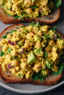Delicious curried chickpea salad with colorful veggies and spices
