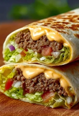 Delicious Big Mac Wraps served on a plate with fresh ingredients