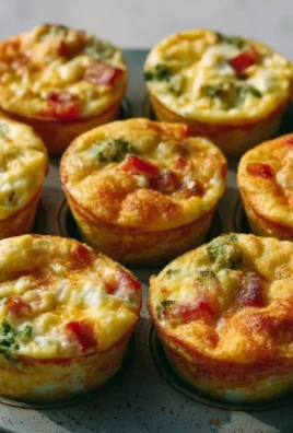 Delicious breakfast egg muffins topped with vegetables