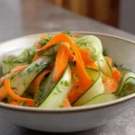Colorful Carrot and Cucumber Ribbon Salad served in a bowl