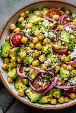 Chickpea Feta Avocado Salad with vibrant vegetables and dressing