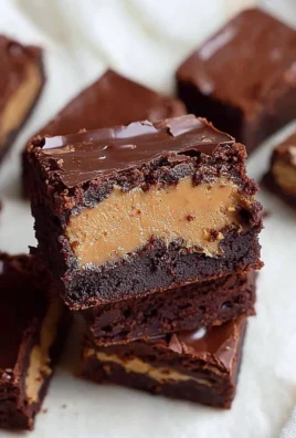 Delicious Chocolate Ganache Brownies topped with rich chocolate glaze