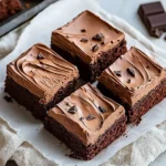 Delicious Chocolate Mousse Brownies topped with whipped cream