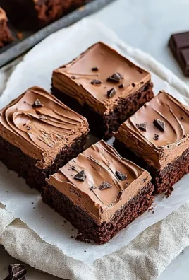 Delicious Chocolate Mousse Brownies topped with whipped cream