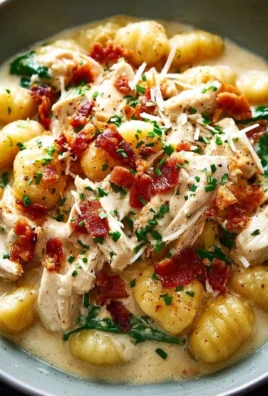Creamy Crack Chicken Gnocchi dish garnished with herbs