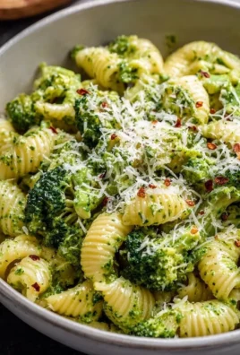 Plate of easy healthy broccoli pasta with garlic and olive oil garnish
