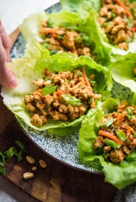 Low Carb Thai Chicken Lettuce Wraps served in fresh lettuce leaves