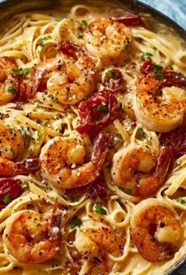 Creamy Marry Me Shrimp Pasta served in a bowl topped with herbs