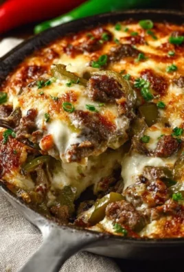 Delicious Philly Cheesesteak Skillet featuring meat, peppers, and cheese