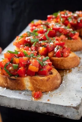 Delicious tomato bruschetta with fresh tomatoes and basil on toasted bread