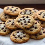 Freshly baked American chocolate chip cookies with gooey chocolate chips
