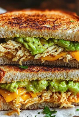 Delicious Chicken Avocado Melt Sandwich with melted cheese and fresh ingredients