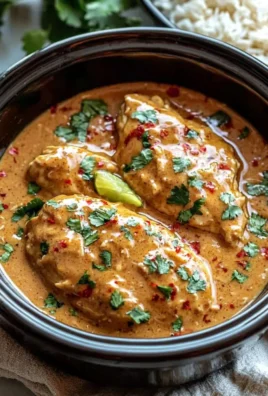 Crockpot Thai Peanut Chicken served with fresh herbs and vegetables
