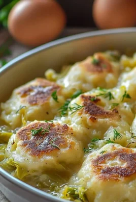 Delicious German cabbage dumplings served with gravy on a plate