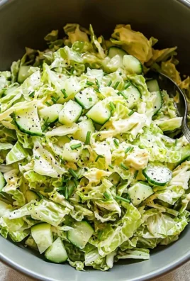 Green Goddess Cabbage Salad with fresh vegetables and dressing