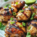 Succulent grilled Vietnamese chicken garnished with fresh herbs and spices