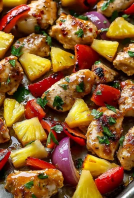 Hawaiian Chicken Sheet Pan with colorful vegetables and pineapple glaze
