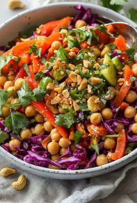 Healthy vegan chopped Thai-inspired chickpea salad with colorful vegetables.