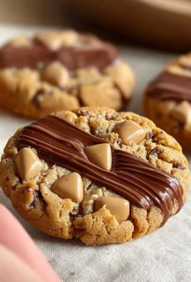 A plate of freshly baked Kinder Nutella cookies with a rich chocolate spread