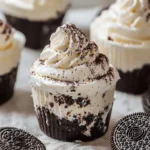 Oreo no-bake cheesecake cups topped with crushed Oreos