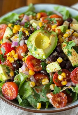 A vibrant Santa Fe Salad with fresh vegetables and toppings