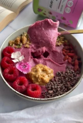 Delicious Glowy Skin Smoothie Bowl topped with fresh fruits and seeds