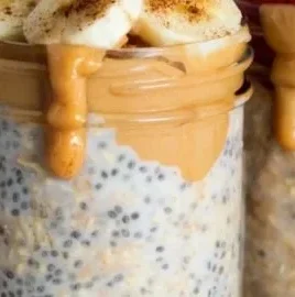 Bowl of high-protein overnight oats topped with fruits and nuts