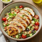 Mediterranean grilled chicken served with lemon herb quinoa salad