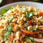 Colorful bowl of Thai Quinoa Salad with fresh vegetables and dressing
