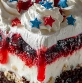 4th of July dessert lasagna with red, white, and blue layers