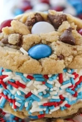4th of July ice cream cookie sandwiches with red, white, and blue sprinkles