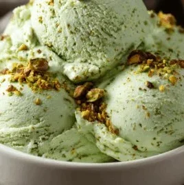 Delicious authentic Italian pistachio gelato served in a cone.