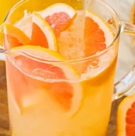 Refreshing Big Batch Palomas cocktail in a festive setting