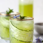 Refreshing Cucumber Lime Mocktail garnished with cucumber slices and lime