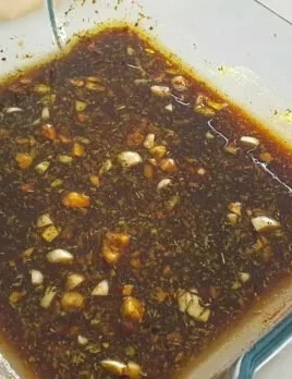 Marinated chicken ready for grilling with easy pantry staple marinade