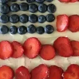Flag Fruit Sugar Cookie Crust Pizza topped with colorful fruits