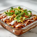High-protein chicken enchilada bowls topped with cheese and fresh ingredients
