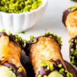 Delicious homemade Pistachio Cannoli topped with chopped pistachios