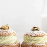 Pistachio Cream Puffs filled with creamy pistachio filling on a plate