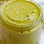 Delicious homemade pistachio cream spread in a jar