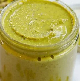 Delicious homemade pistachio cream spread in a jar