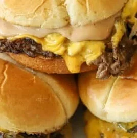 Delicious homemade smash burgers with melted cheese and fresh toppings