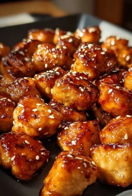 Sweet and smoky honey garlic chicken bites served on a plate
