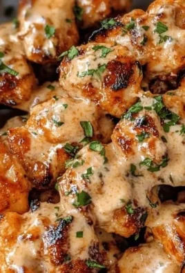 Savory Bang Bang Chicken Skewers grilled to perfection and served on a platter