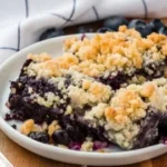 Delicious homemade blueberry crisp dessert with a crunchy topping.