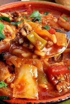Delicious cabbage soup with ground beef served in a bowl, perfect for a hearty meal.