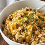 Cheesy Ground Beef and Rice Casserole baked in a dish, ready to serve.